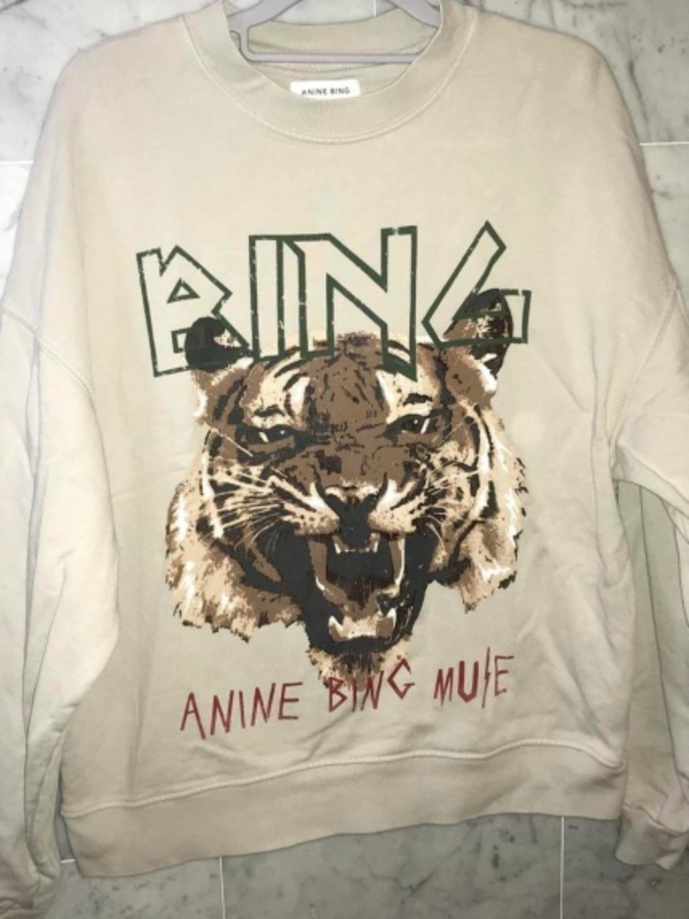 Anine Bing  crewneck with tiger graphic and Muse text in cream size Medium NWOT